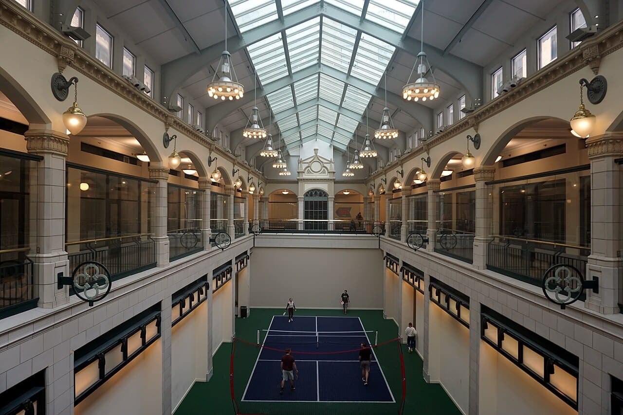 An indoor pickleball court inside the historic Plankinton Arcade in Milwaukee, Wisconsin.