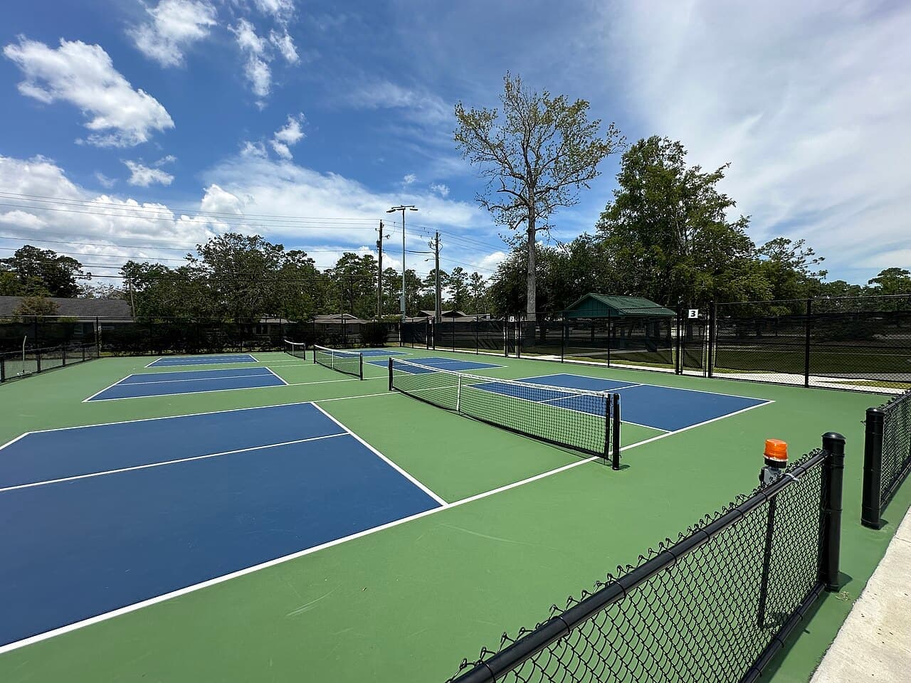Three outdoor pickleball courts at the Harry B. Anderson Tennis Center in Valdosta, Georgia.